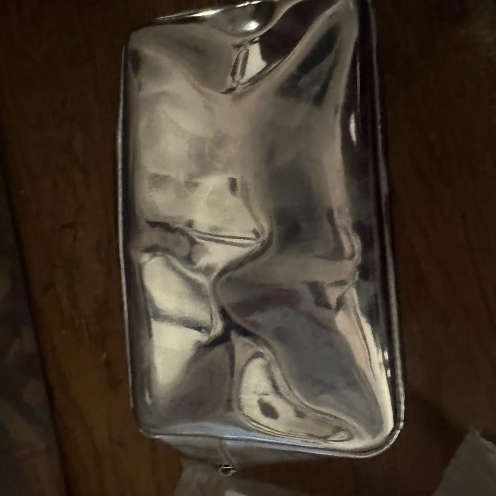 Redken Limited edition silver makeup bag NEW